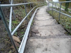 Wheel guide rail up the steps from the canal to the station fitted by Belmont Construction, Bromley Rd, Congleton. 